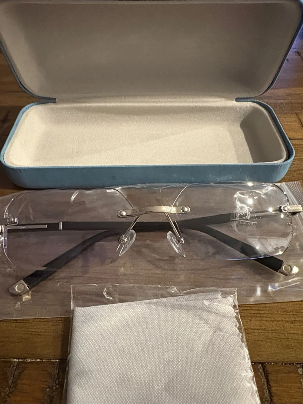 Clarity Blue Glasses Rimless Blue Lens Sunglasses